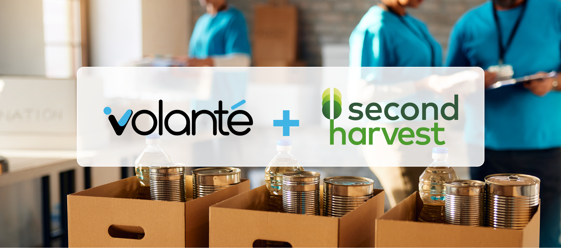 Volanté and Second Harvest Image with Volunteers helping with a food bank